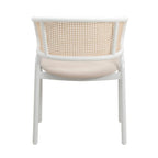 Chaise d'appoint moderne et élégante avec dossier en rotin et pieds en acier blanc pour salle à manger et cuisine