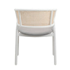 Chaise d'appoint moderne et élégante avec dossier en rotin et pieds en acier blanc pour salle à manger et cuisine