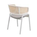 Chaise d'appoint moderne et élégante avec dossier en rotin et pieds en acier blanc pour salle à manger et cuisine